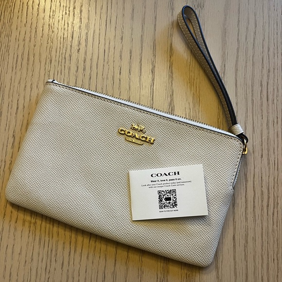 Coach Handbags - Brand New Cream Coach Wristlet